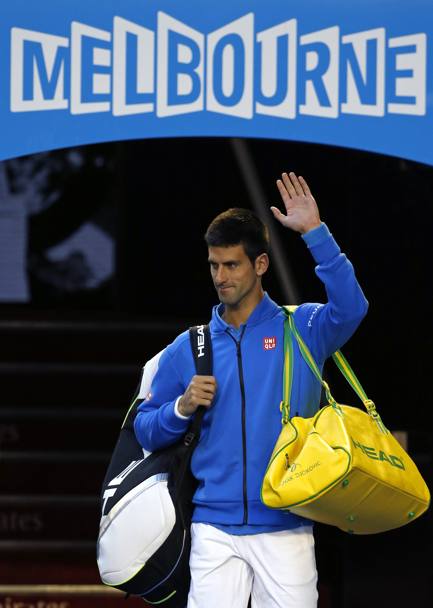 Australian Open 2015. Quarti di finale. Novak Djokovic fa il suo ingresso in campo per il match contro il canadese Milos Raonic (Ap)
